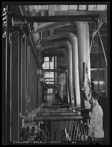 New type of plating machine being used at the Hamilton Standard Propeller Corporation. It automatically dips the part into the proper solutions for the proper length of time. East Hartford, Connecticut