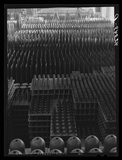 Propellers in the rough and propeller assembly parts on the floor of the Hamilton Standard Propeller Corporation. East Hartford, Connecticut
