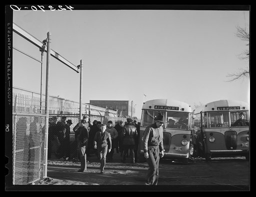 Workmen leaving the plant at the Vought Sikorsky Aircraft Corporation. Stratford, Connecticut