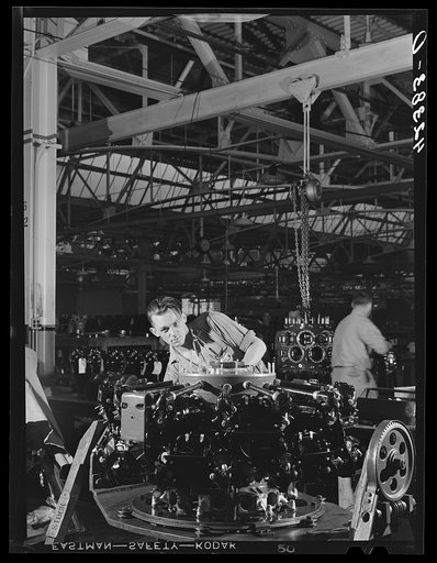 Winging on the final stages of a Pratt and Whitney Aircraft motor at East Hartford, Connecticut