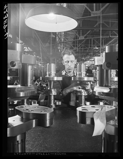 Inspection of camshafts for motors at the Pratt and Whitney Aircraft Corporation. East Hartford, Connecticut