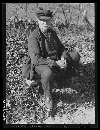 Jim Grey, retired old farmer of Ledyard, Connecticut, waiting for the noon mail at the crossroads