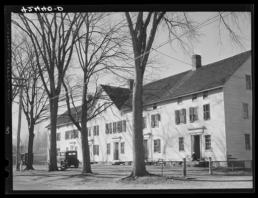 Untitled photo, possibly related to: Old company house in Fitchville, Connecticut. The Palmer Brothers mill in town is busy with orders for comforters for the Army