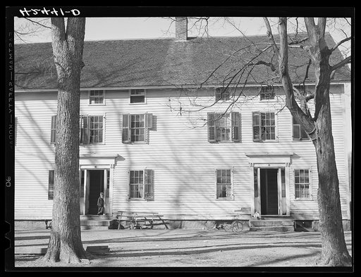 Old company house in Fitchville, Connecticut. The Palmer Brothers mill in town is busy with orders for comforters for the Army