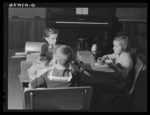 Untitled photo, possibly related to: Children having lunch in the schoolhouse in Ledyard, Connecticut
