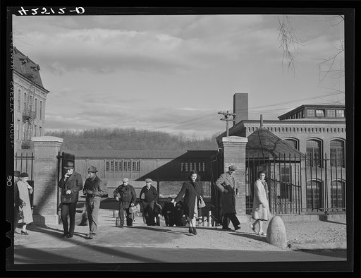 Employees leaving the Denomah Mills in Taftville, Connecticut, at the end of the afternoon shift