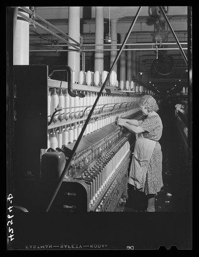 Spinning cotton thread at the Denomah Mills, Taftville, Connecticut. Makers of rayon and cotton cloths