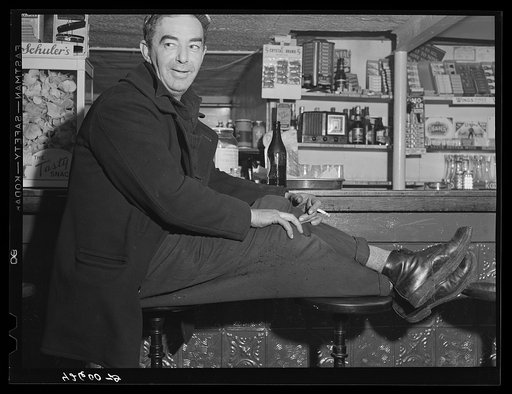 Untitled photo, possibly related to: Shipyard worker in for a "beer" after work. A bar just outside the Bath Iron Works, Bath, Maine