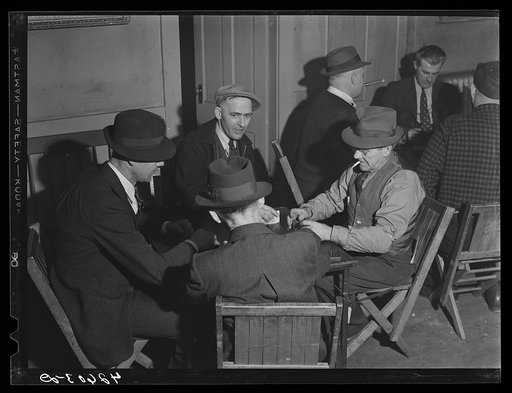 Untitled photo, possibly related to: Shipyard workers playing cards at the "Senator Baxter," a hotel, recreation hall and general "get together." Bath, Maine