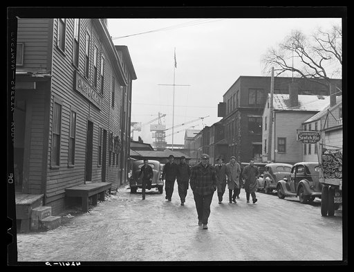 Untitled photo, possibly related to: Men coming out of the shipyard at noon hour for lunch. Bath, Maine