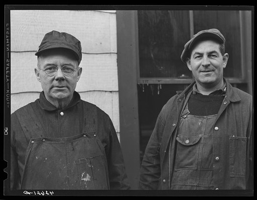 Portrait of two workers at the Bath Iron Works. Bath, Maine