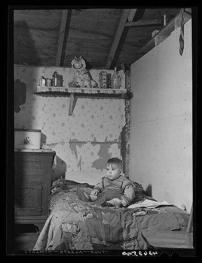 The youngest of Mrs. Arthur Brown's children in the kitchen. Bath, Maine. Refer to caption #42624-D