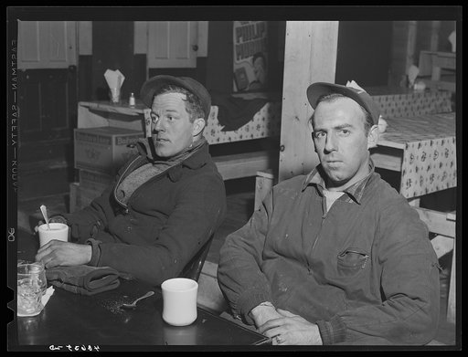 Two shipyard workers in for a cup of coffee after work at the Bath Iron Works. Left is Paul Jacobs and Ronnie Williams. Both live about eighteen miles outside of Bath, Maine