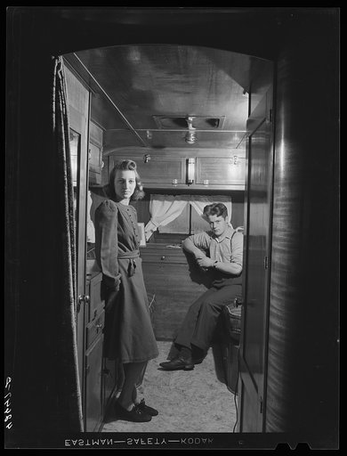 Mr. and Mrs. Leslie Bryant in their trailer about two miles out of Bath. Mr. Leslie Bryant works in the shipyard. They have been living in the trailer for two months. They could not rent in Bath and although a trailer cost them almost as much as a house, Mr. Bryant feels that it is a better investme