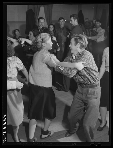 A Saturday night square dance run by Mr. and Mrs. Tucker in Clayville, Rhode Island. Mr. Tucker is the town police force
