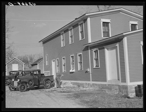 Removing corn cobs at Kenyon's johnnycake flour mill in Usquepaugh, Rhode Island