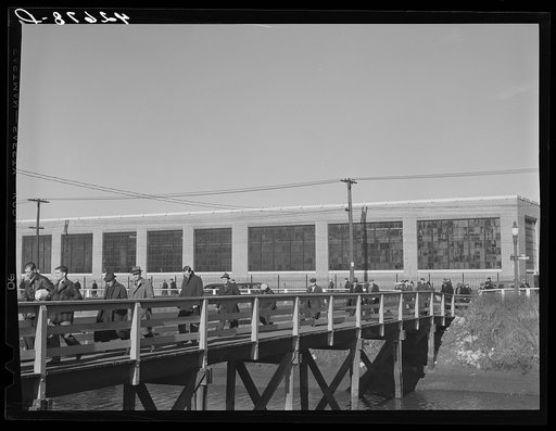 Men leaving the Browne and Sharpe Manufacturing Company in Providence, Rhode Island at the end of the shift