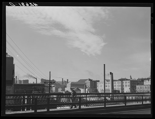Untitled photo, possibly related to: Textile mills seen from a bridge in Woonsocket, Rhode Island