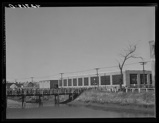 Untitled photo, possibly related to: Men leaving the Browne and Sharpe Manufacturing Company in Providence, Rhode Island at the end of the shift