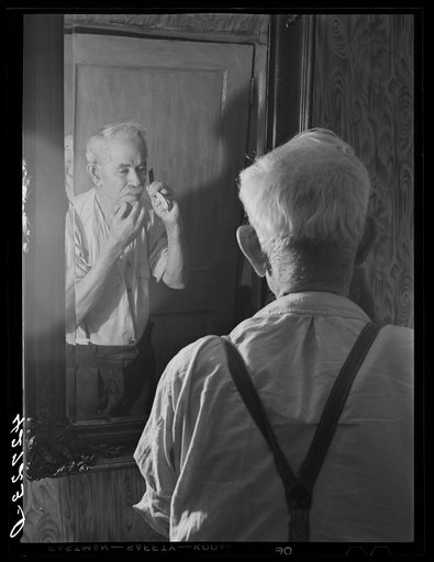 Father of Joseph Oulette, French Canadian FSA (Farm Security Administration) client. Their time is divided between truck farming in the warm seasons and cutting timber and hauling loads with their truck in winter. Tiverton, Rhode Island