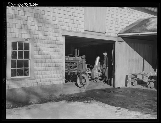 Equipment shed of Mr. Peabody, FSA (Farm Security Administration) client near Newport, Rhode Island. All the machinery is freshly cleaned and painted and the place is a model of the proper way to care for farm equipment