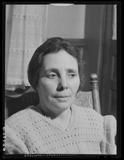 Mrs. La Rosa, Italian, with her husband and son runs a vegetable farm in Methuen, Massachusetts. The men work in the mill whenever they can and the son also runs the farm in the summer