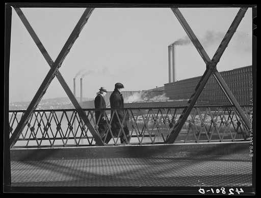 Men going to work in a textile mill in Lawrence, Massachusetts