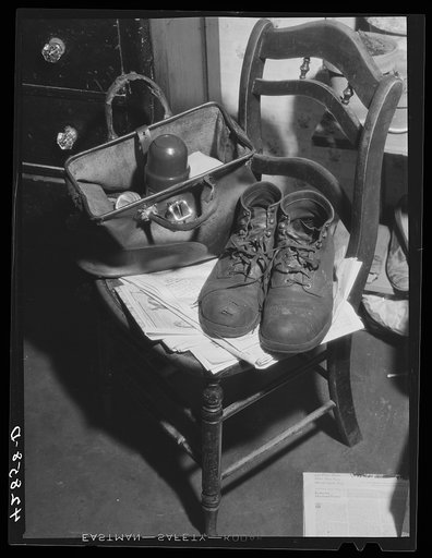 Shoes and lunch taken by Mr. Fairchild to work at a steel works in Boston, Massachusetts. He is a vegetable farmer near Saugus, Massachusetts