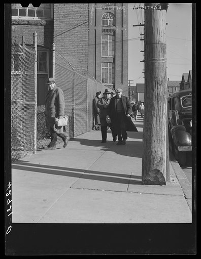 Workers entering a textile mill in New Bedford, Massachusetts