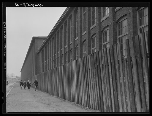 Outside a large textile mill in New Bedford, Massachusetts
