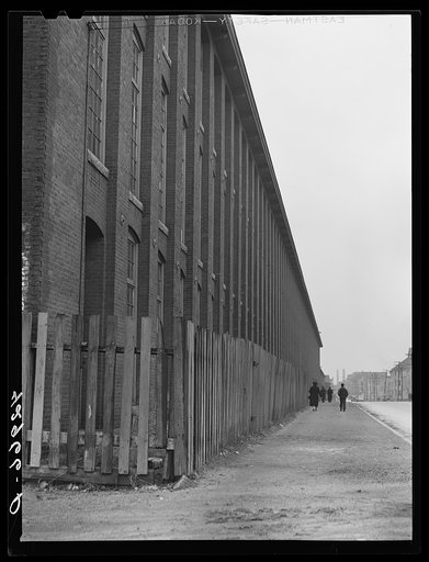 Outside of a large textile mill in New Bedford, Massachusetts