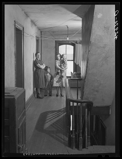 Tenants living in the crackerbox. Slum tenement in Beaver Falls, Pennsylvania