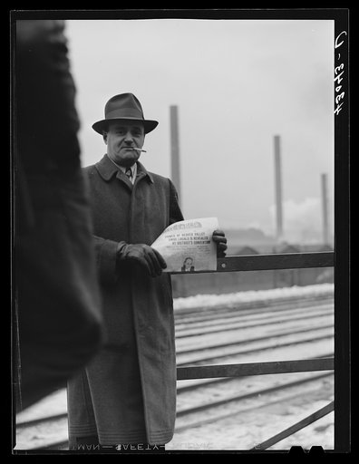 Untitled photo, possibly related to: Union member distributing "Steel Labor" near the entrance the the Jones and Laughlin Steel Corporation in Aliquippa Pennsylvania