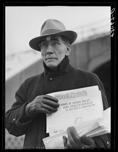 Union member distributing "Steel Labor" near the entrance the the Jones and Laughlin Steel Corporation in Aliquippa Pennsylvania