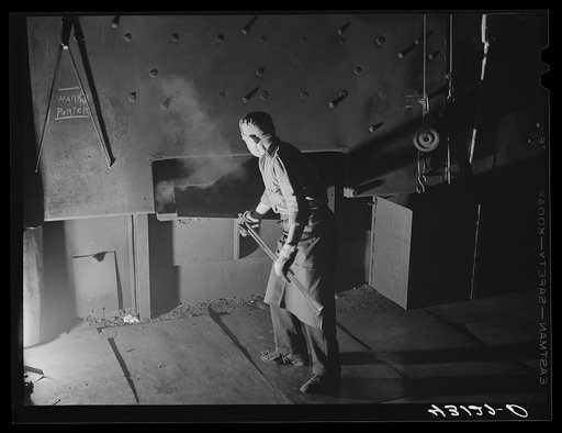Worker at furnace in Washington Tinplate Company in Washington, Pennsylvania