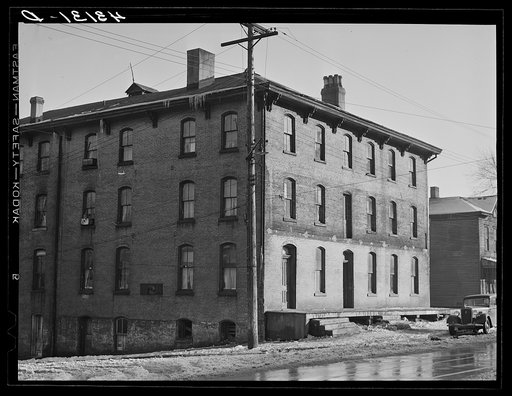 The "crackerbox" housing eighty-seven people. Beaver Falls, Pennsylvania