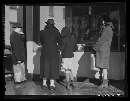 Saturday afternoon shoppers waiting for a bus in Beaver Falls, Pennsylvania