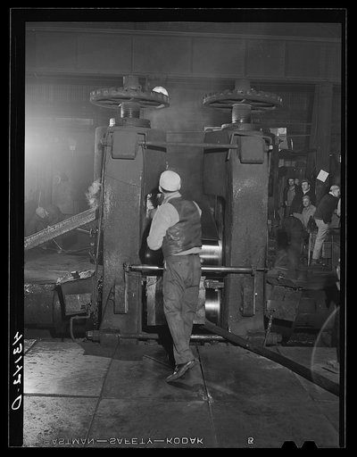 At a rolling machine in the Washington Tinplate Company. Washington, Pennsylvania