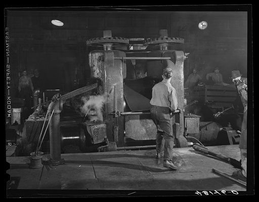 Untitled photo, possibly related to: At one of the rolling machines in the Washington Tinplate Company. Washington, Pennsylvania