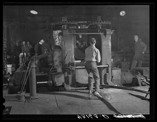 At one of the rolling machines in the Washington Tinplate Company. Washington, Pennsylvania