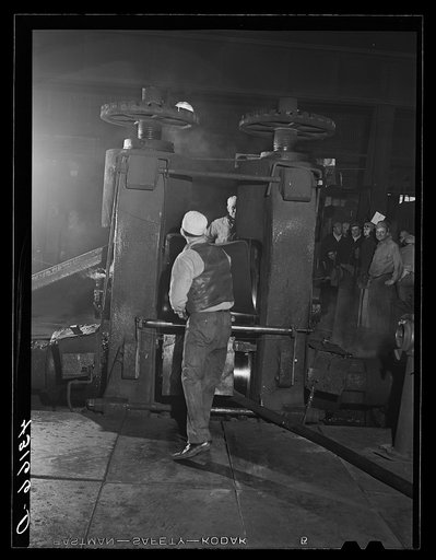 Workers at rolling machine in Washington Tinplate Company. Washington, Pennsylvania