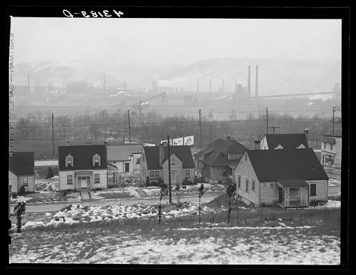 Untitled photo, possibly related to: Houses in Baden, Pennsylvania. In the background is the Jones and Laughlin Steel Plant across the river in Aliquippa