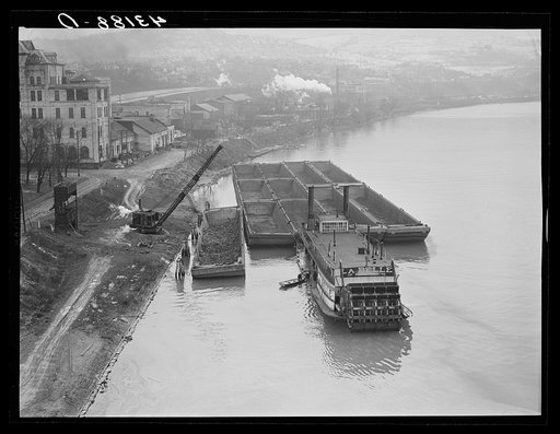 Untitled photo, possibly related to: Coal barges along Ohio River at Rochester, Pennsylvania