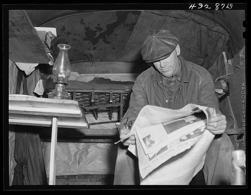 Untitled photo, possibly related to: This man is a carpenter at Fort Bragg, North Carolina. This converted truck is his home. The interior of his truck was more roomy than most of the cabins that had been built at the camp where he was staying. At a settlement near Silver Lake, North Carolina (about