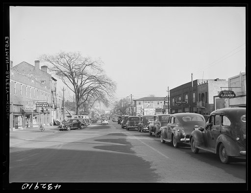 Traffic on the main street of Fayetteville, North Carolina at about five o'clock, when the workers start coming out of Fort Bragg, North Carolina