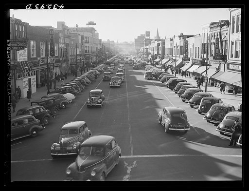 Untitled photo, possibly related to: Traffic on the main street of Fayetteville, North Carolina at about five o'clock, when the workers start coming out of Fort Bragg, North Carolina