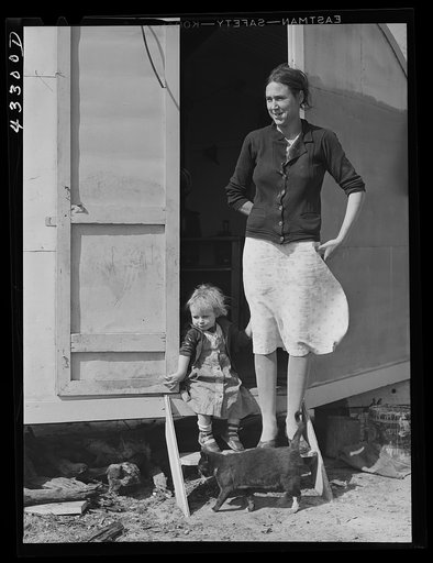 Untitled photo, possibly related to: Her husband works at Fort Bragg, and expects to be laid off any day. They come from South Carolina and have been living in a trailer for two years.  Don't know where they will go next. Near Fort Bragg, North Carolina