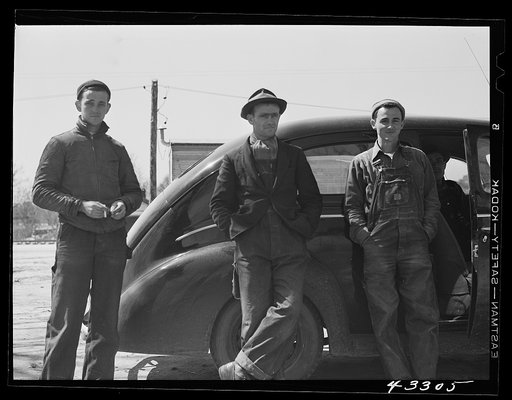 Untitled photo, possibly related to: These men stopped at a trailer settlement to see about buying a trailer. They were very uncertain about how long their work would continue at Fort Bragg. Near Fayetteville, North Carolina