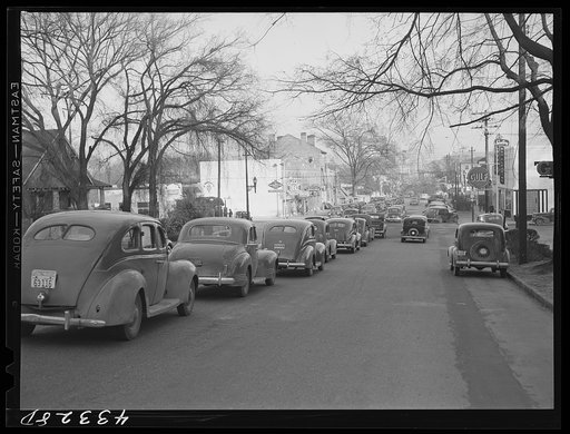 Untitled photo, possibly related to: A street in Fayetteville, North Carolina about 4:30 p.m. when workers are coming out of Fort Bragg, North Carolina