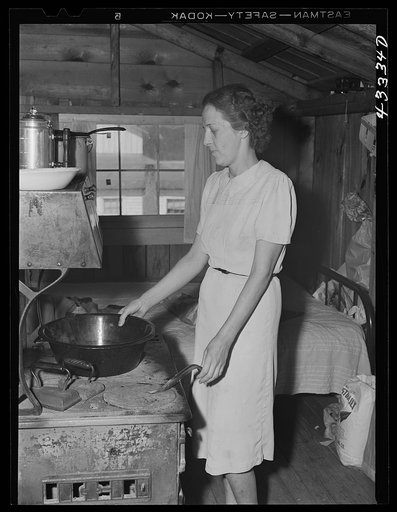 Untitled photo, possibly related to: Children of workers from Fort Bragg living in a tobacco barn converted into living quarters near Fayetteville, North Carolina